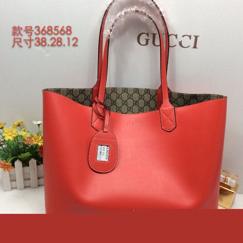 G*u*i shopping bags